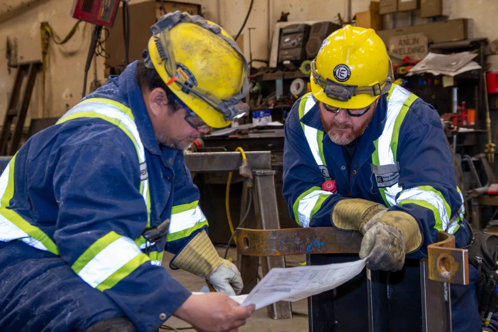 two engineers checking ndt reports