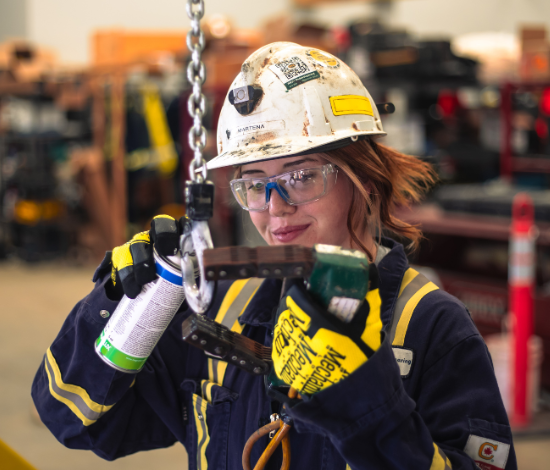 Female Engineer doing Magnetic Particle Testing Services