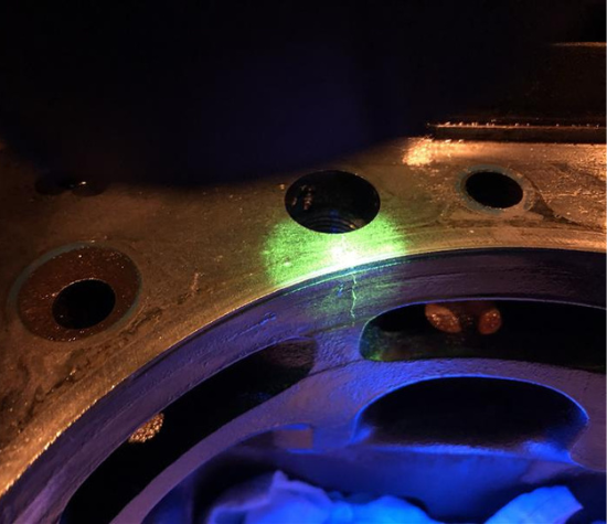 Wet Fluorescent Magnetic Particle Testing